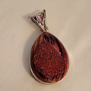 Sajen SS tiger stripe druzy with teardrop stone set in bale.